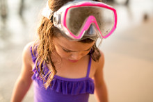 Girl In Purple Swim Suit And Snorkel Mask