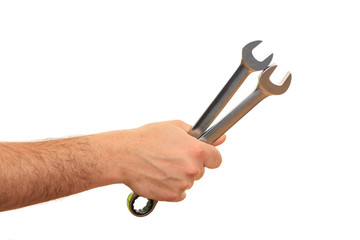 Canvas Print - Hand holding spanners on white background