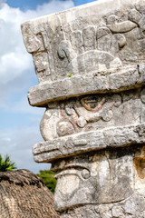 Canvas Print - Face of the Ancient Mayan Rain God Chaac on the corner of the Temple of the Frescoes in the Tulum Archaeological Zone, Quintana Roo, Mexico