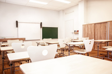 Wall Mural - Empty classroom with chairs and desks