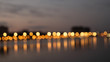 Bokeh night lights blurry abstract backgroun og city waterfront in a night