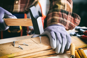 Sticker - Carpenter holding a hammer