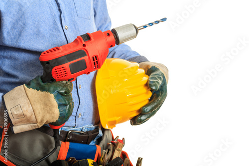 Plakat Pracownik trzyma elektrycznego świder