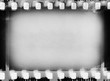 © manbetta - Black and white camera film vintage background.