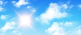Fototapeta Na sufit - Sunny background, blue sky with white clouds and sun