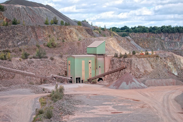 Wall Mural - View into a quarry mine and stone crusher