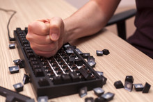 Man Smashes A Mechanical Computer Keyboard In Rage Using One Fist