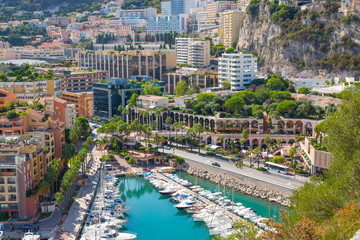 Wall Mural - Monaco, Monte Carlo. View of the marina with luxury yachts and residential development