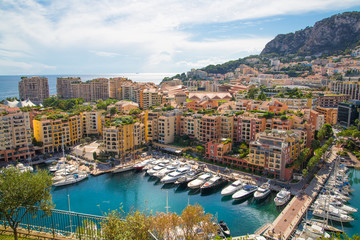 Wall Mural - Monaco, Monte Carlo. View of the marina with luxury yachts and residential development