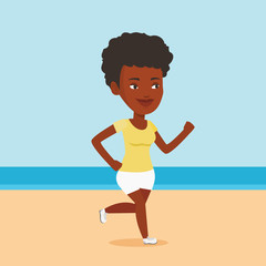 Poster - Young sporty woman jogging on the beach.