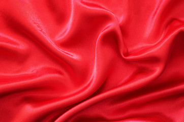 Red silk fabric draped in the form of heart