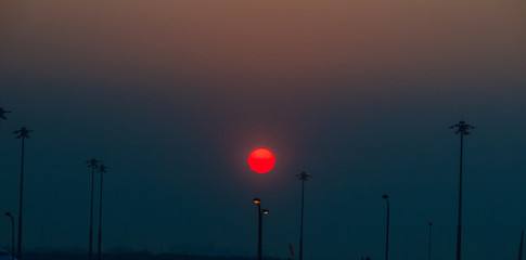 Wall Mural - Beautiful Nature Egg Yolk Sunrise with colourful sky environment
