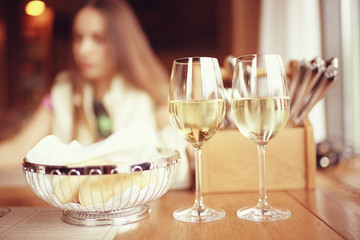 restaurant serving wine woman