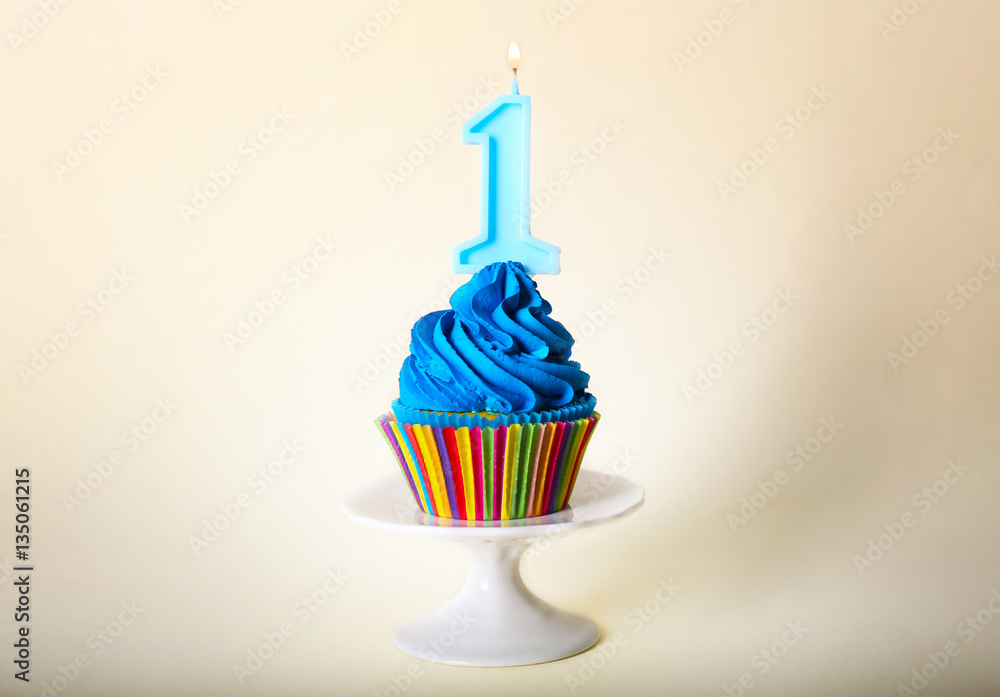 Tasty cupcake on color background