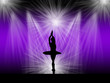 © DemoncicPhoto - Ballerina silhouette performing ballet on the rich background light stage