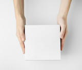 Fototapeta Mapy - Female hands with box on white background