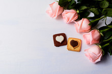 St. Valentine's Day Background With Five Pink Roses And Cookies