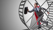 © Elnur - Businessman running on hamster wheel