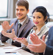 © yurolaitsalbert - Close-up of business people clapping hands
