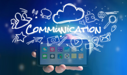 Concept of man holding smartphone with Communication icon around