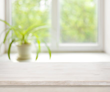 Light Wooden Table On Defocuced Summer Window Background