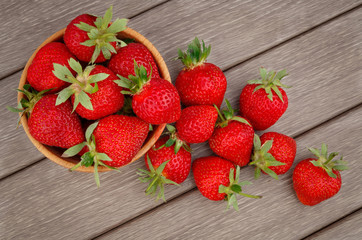 Wall Mural - Strawberry in bowl on wooden