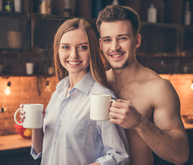 Wall Mural - Beautiful couple in the kitchen