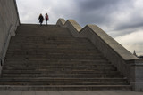 Fototapeta Sawanna - silhouette of people moving on stairs,