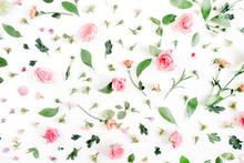Floral Pattern Made Of Pink And Beige Roses, Green Leaves, Branches On White Background. Flat Lay, Top View. Valentine's Background