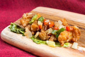 wok fried chicken stir fry with sweet peppers and chinese vegeta