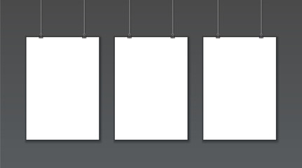 Fototapete - Empty white vector poster templates on dark gray background. Poster mock up. Template of three white blank vector posters. Collection of paper poster mockups hanging on wall. Frame for paper sheet. 