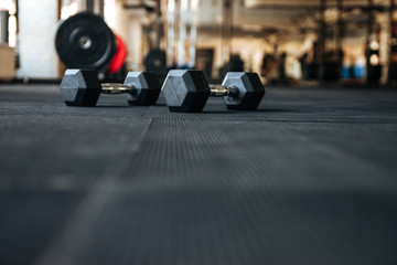 dumbbells on the floor in gym