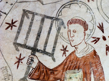 St. Lawrence Holding A Gridiron And A Book