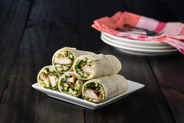 Poster - Breaded Chicken burrito Wrap With Fresh Lettuce Cheese on rustic