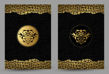 Aufkleber - set of two banners with stylized golden and black lion head and gold texture decoration on the black background.