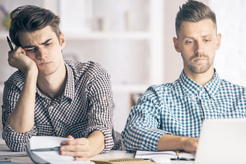 Poster - Portrait of men working on project