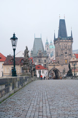 Wall Mural - Prague, Czech - November, 24, 2017: People on Charles Bridge in Prague