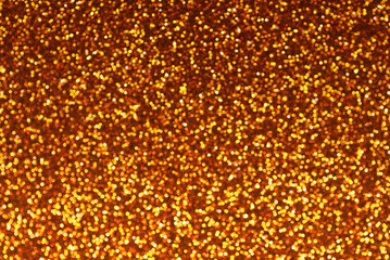 Wall Mural - shiny gold blurred glitter bokeh abstract background