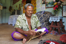 Indigenous Fijian Man Reads The Bible In Fiji