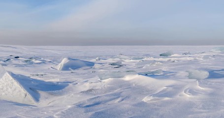 Wall Mural - ice and snow on the surface of the frozen sea.