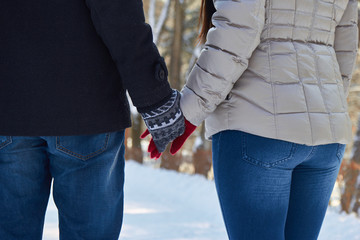 Young couple holding hands 