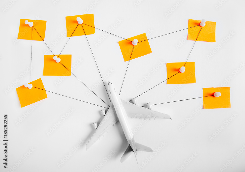 Preparation network for Traveling concept, push pin, string, paper noted on white background with copy space.
