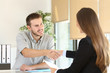 © Antonioguillem - Employee and boss handshaking after a job interview