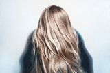 Fototapeta  - Healthy dyed blond hair of young woman