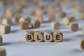 blue - cube with letters, sign with wooden cubes