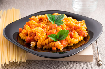 Cooked pasta girandole with vegetable sauce