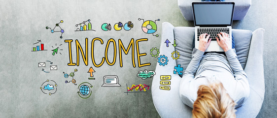Wall Mural - income text with man using a laptop