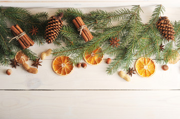 Christmas background with Christmas tree branches, pine cones, d