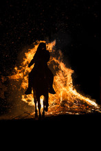 Horse Riding Through Bonfire