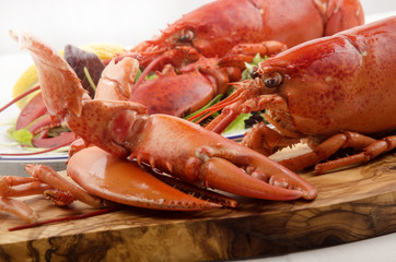 Poster - freshly cooked lobster on a wooden board